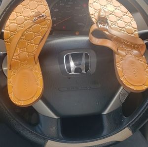 Gucci leather monogram sandals (flip flops)